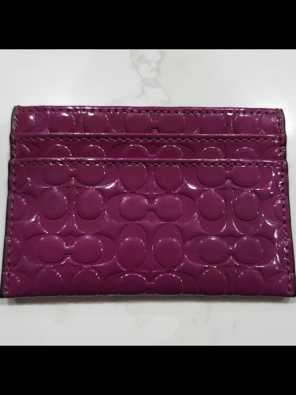 EUC Authentic Coach Signature Embossed Liquid Gloss Card Case in Berry